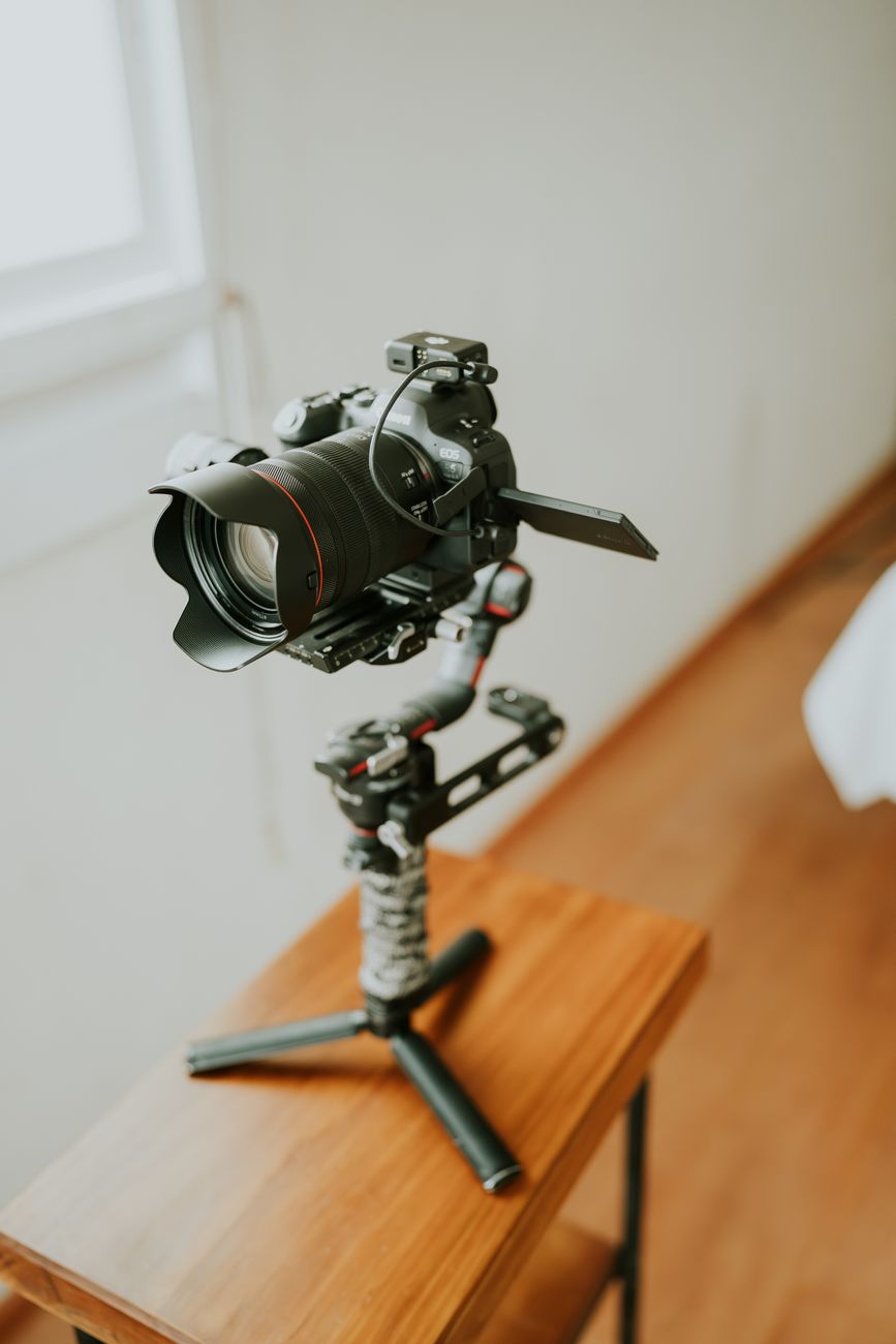 High dynamic range digital cinema production camera on a tracking slider rail ready to capture motion film